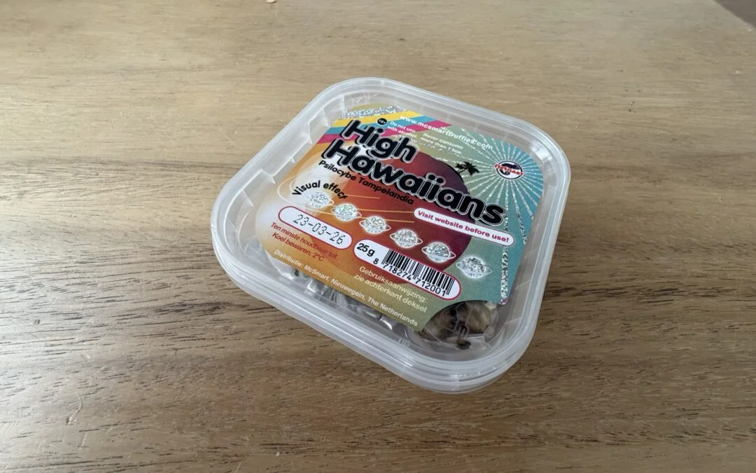 Clear plastic container of 25g fresh High Hawaiians psilocybin truffles with visual effects label and storage instructions